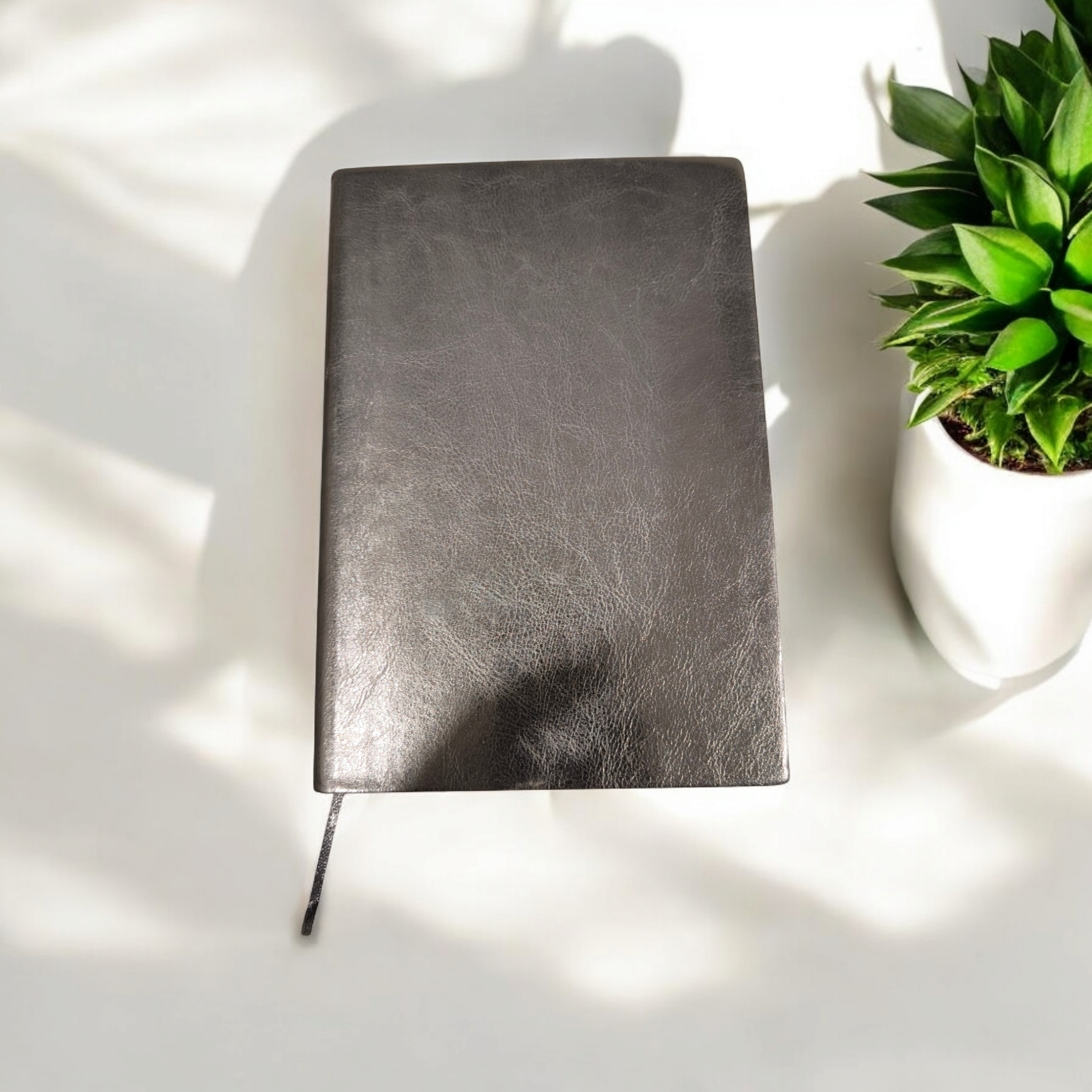 Black Plain A5 Size Notebook.